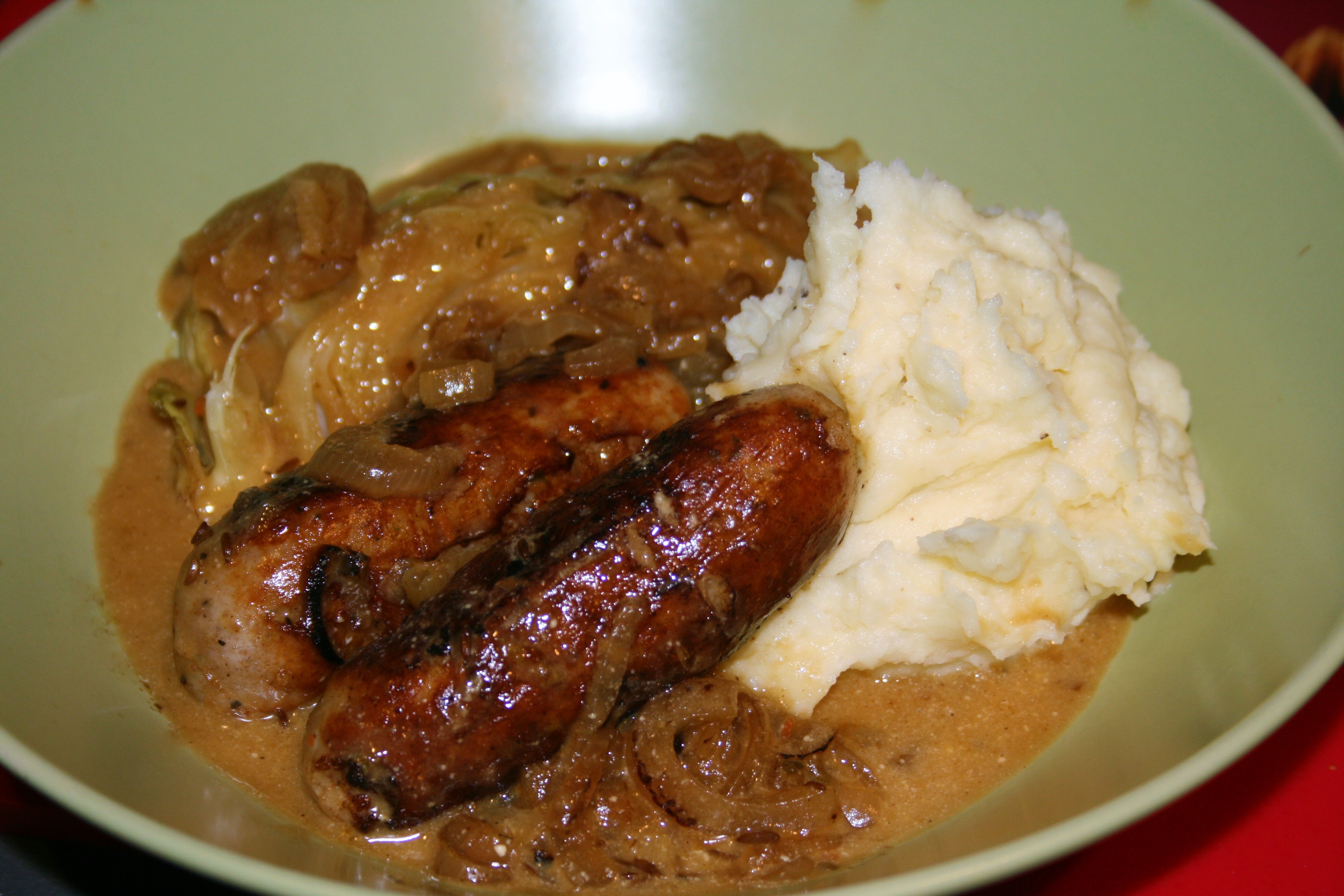 Bangers and mash with braised cabbage and caraway seeds Full As An Egg